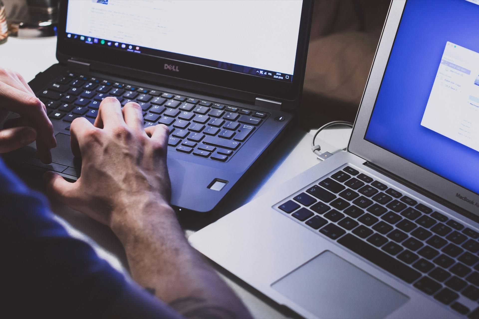 Reviewing website and search performance data across two laptops
