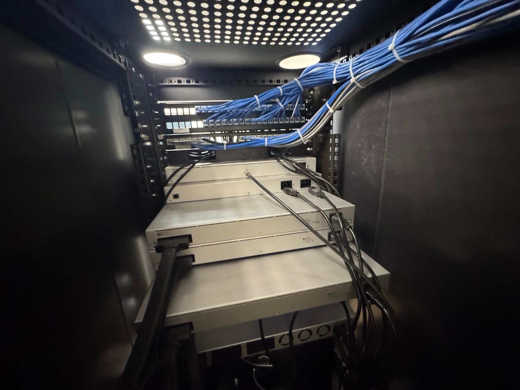 A bundled cable run feeding into a server rack